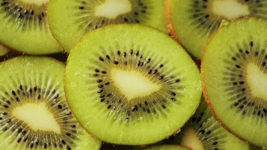 Close-up of kiwi slices. Fresh and healthy fruits. High quality 4k footage