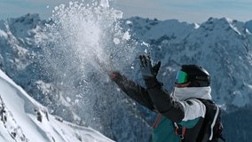 Skier throwing snow in the Italian Dolomites during sunny day . Super slow motion at 1000 fps . - Powered by Shutterstock - Get 15% off with code: PIKWIZARD15