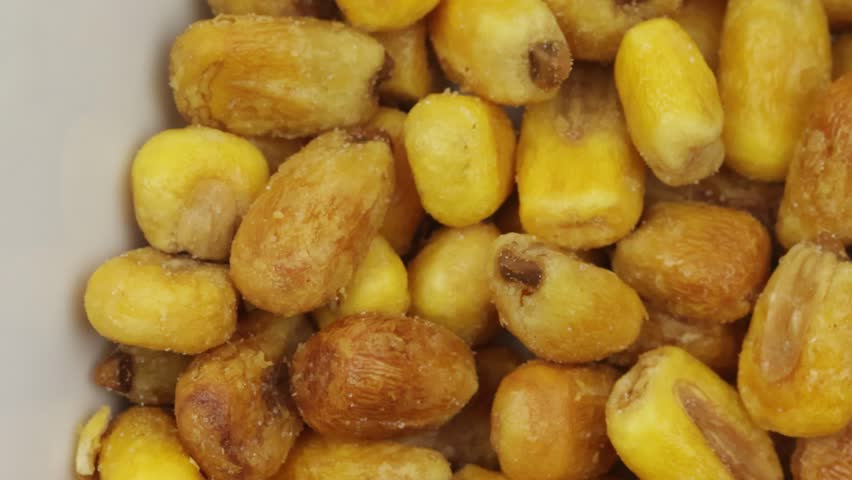 salted corn background, close up.