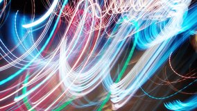 Timelapse flickering light trails. Blurry colorful city streak lights glowing at night, long exposure transformations bright multicolored street illumination. Curved lines change with strobe effect - Powered by Shutterstock - Get 15% off with code: PIKWIZARD15