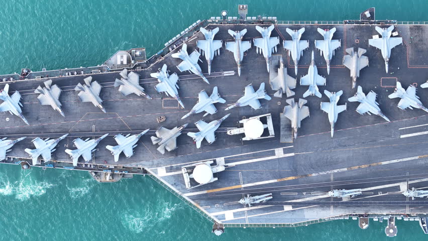 Nuclear war ship, Navy ship, Military navy. nuclear carrier running in the ocean. Military navy ship carrier full loading fighter jet aircraft for prepare troops