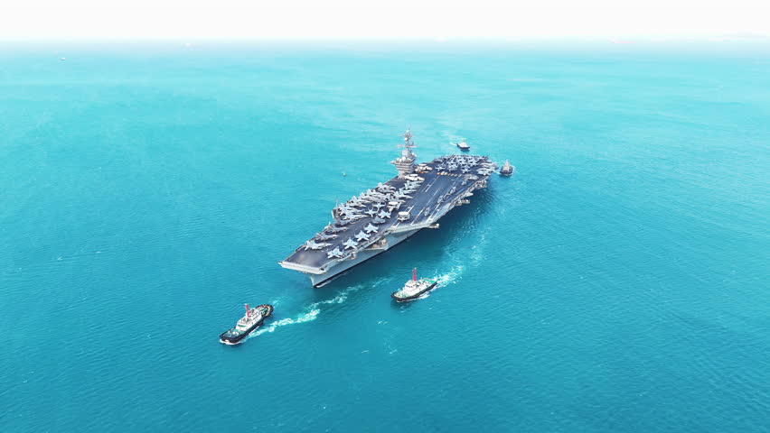 Nuclear war ship, Navy ship, Military navy. nuclear carrier running in the ocean. Military navy ship carrier full loading fighter jet aircraft for prepare troops