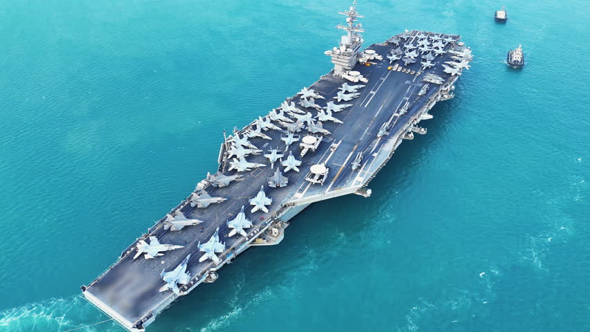 Nuclear war ship, Navy ship, Military navy. nuclear carrier running in the ocean. Military navy ship carrier full loading fighter jet aircraft for prepare troops