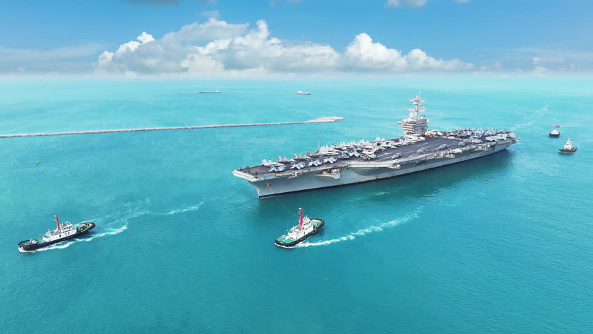 Nuclear war ship, Navy ship, Military navy. nuclear carrier running in the ocean. Military navy ship carrier full loading fighter jet aircraft for prepare troops