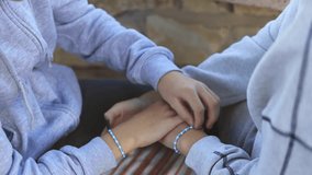 Matching friendship bracelets adorning wrists, young companions sharing  moment, symbolizing close emotional connection and unbreakable trust between friends.Happy friendship day - Powered by Shutterstock - Get 15% off with code: PIKWIZARD15