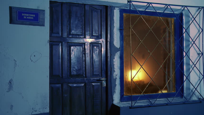 Warm Light From a School Dorm for Children in Argentina, Exterior Night Shot - 4K