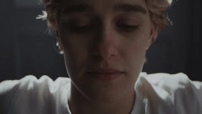 Stressed woman with eyes full of tears sits alone portrait closeup. Lady suffers form negative emotions experiences depression disorder episode - Powered by Shutterstock - Get 15% off with code: PIKWIZARD15