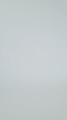 Hand holding waffle cone with cherries, Vertical template for advertising cafes, pastry shops, ice cream with a creative image of fruit ice cream and summer mood