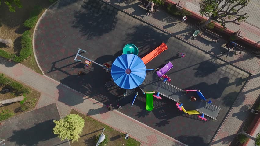 Aerial View Scenic Playground Captured from Above with Play Structures and Open Areas