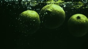Limes Drop in Slow Motion - Powered by Shutterstock - Get 15% off with code: PIKWIZARD15