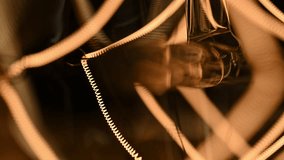 The filament in the Edison lamp becomes hot and glows brightly from the voltage. Super macro video. Electricity in the modern world. - Powered by Shutterstock - Get 15% off with code: PIKWIZARD15