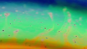 A colorful macro shot showing the mixing of liquids, highlighting bright and dynamic hues - Powered by Shutterstock - Get 15% off with code: PIKWIZARD15