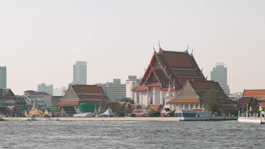 Wat Kanlayanamit Buddhist temple on the bank of the Chao Phraya River early morning in Bangkok