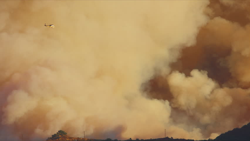 In Malibu, California, a massive fire rages as helicopters combat the flames, highlighting natures fury and its devastating impact on the environment and community in January 7, 8, 9, 2025