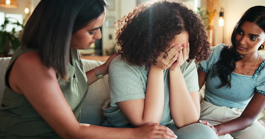 Sad, crying and friends with support, home and women with sympathy in living room, unhappy and care. House, comforting and emotional for rejection of university, consoling and people with empathy