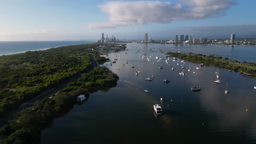 Forward moving aerial view over Doug Jennings Park looking South towards Surfers Paradise, Gold Coast, Australia.