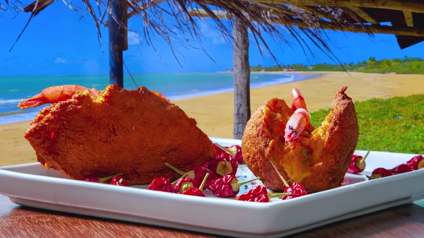 Acarajé is a typical dish from Bahia made with beans and palm oil.