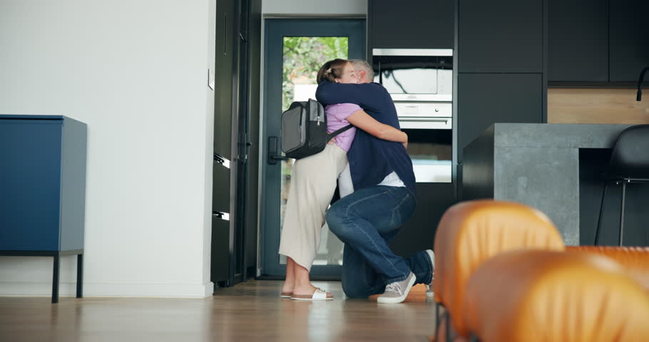 Morning, father and girl with hug for school, education and ready for learning on first day at home. House, dad and child with backpack for leaving, goodbye embrace and parent for support in kitchen