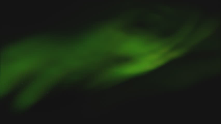 A single green leaf gracefully suspended in mid-air against a black backdrop, evoking a sense of mystery and intrigue. Its significance remains open to interpretation