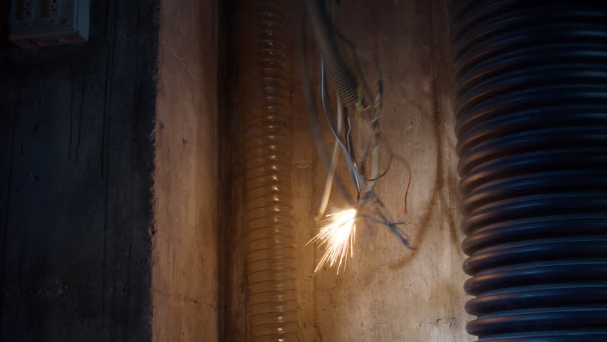 A hanging wires makes a short circuit with sparks