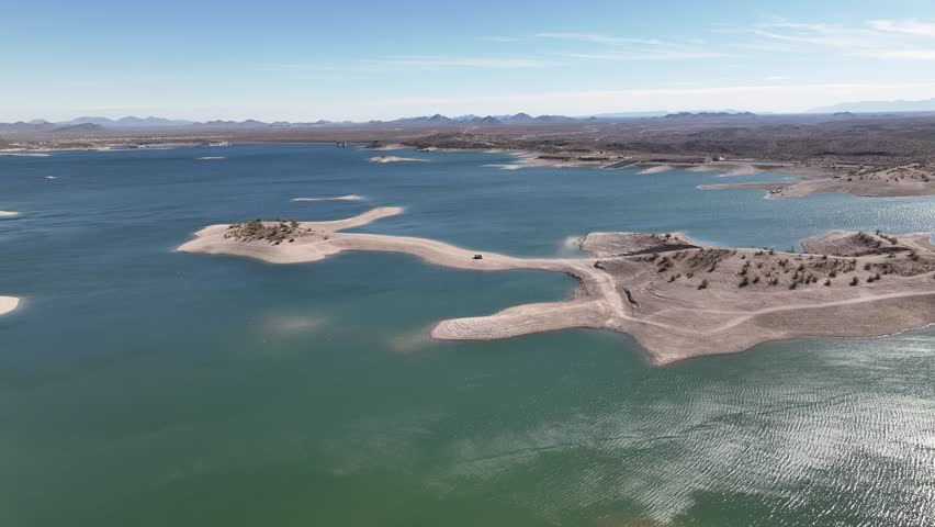 Aerial view of serene Lake Pleasant with tranquil islands and a clear sky, Peoria, United States.