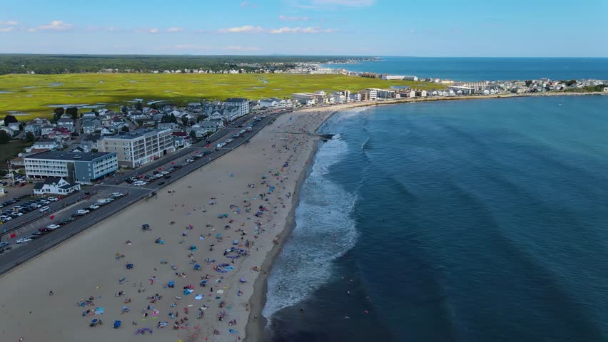 Hampton Beach aerial view including historic waterfront buildings on Ocean Boulevard and Hampton Beach State Park, Town of Hampton, New Hampshire NH, USA.