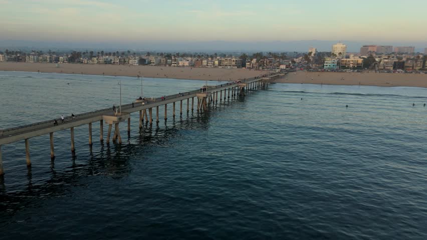 Aerial Drone Flyover of Venice Beach Pier Towards Shore, Los Angeles, California, USA