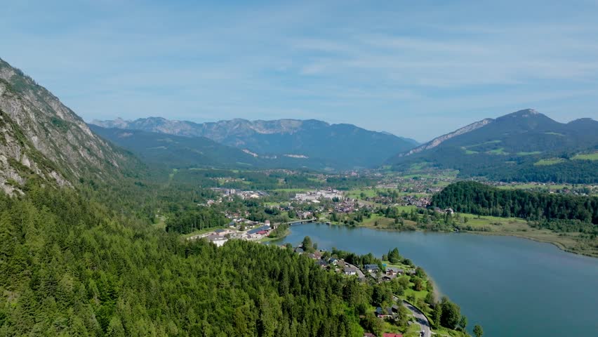 beautiful landscape of a lake in austria surrounded by beautiful mountains - Holiday in austria - hallstatter see