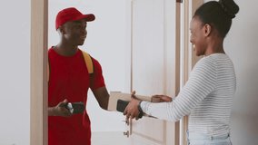 A smiling man in a red cap hands a package to a woman at her apartment door. She holds a smartphone, engaged and appreciative of the delivery service. - Powered by Shutterstock - Get 15% off with code: PIKWIZARD15