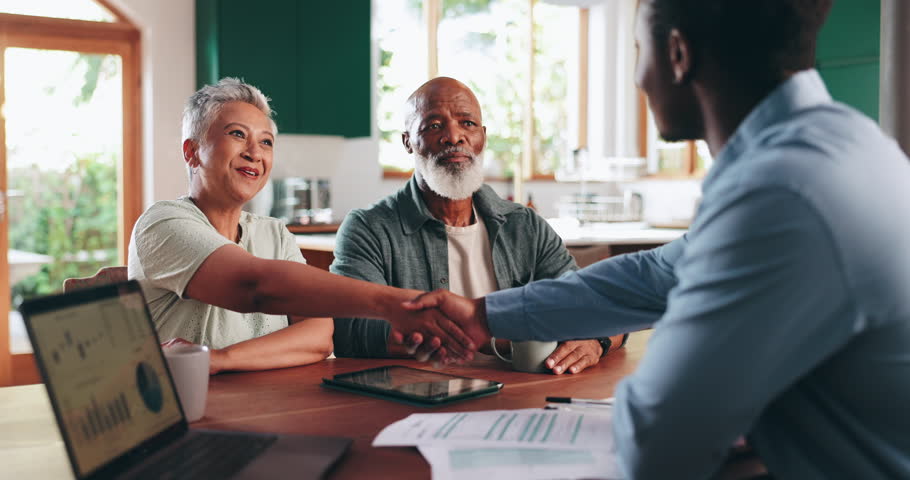 Handshake, meeting and financial advisor with old couple at home for planning, retirement fund and consulting. Welcome, life insurance agent and shaking hands with people for mortgage agreement