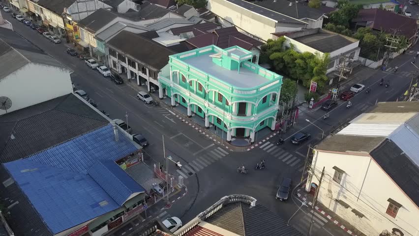 A stunning aerial view showcasing colorful buildings and busy streets, highlighting urban life and architecture in a dynamic city environment.