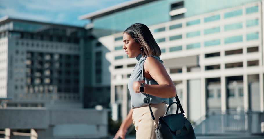 Woman, late for work and stress in city with commute, check watch and hurry in morning. Rushing, employee and walking fast in urban Colombia for appointment, important meeting or poor time management