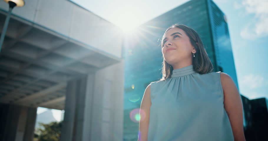 Buildings, thinking and happy businesswoman in city for travel or decision with low angle or view. Imagine, realtor or urban developer in street for inspiration with confidence and property ideas