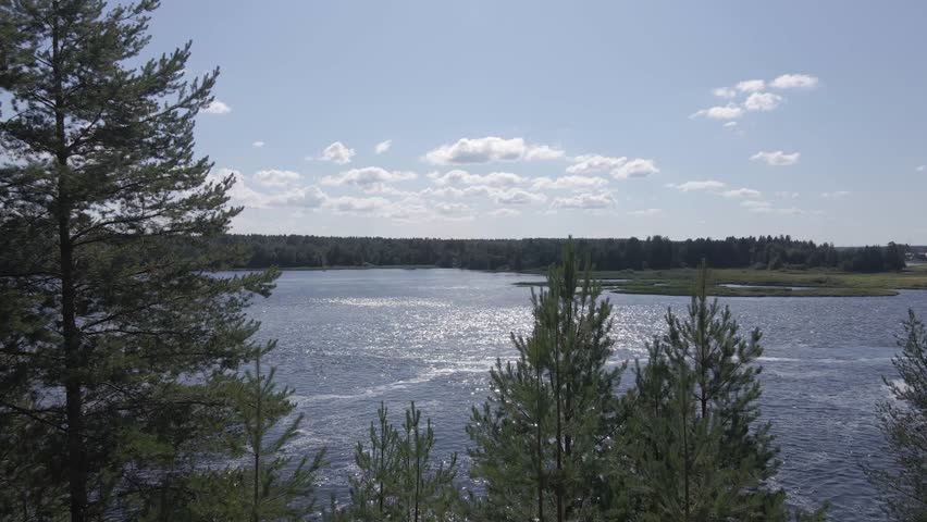 Russia, Lake Onega. View of the coast of the island in a cold lake. Beautiful nature of the Republic of Karelia. Panoramic view from the height of the Ladoga