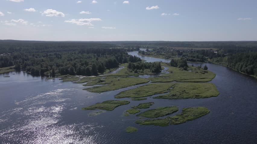 Russia, Lake Onega. View of the coast of the island in a cold lake. Beautiful nature of the Republic of Karelia. Panoramic view from the height of the Ladoga