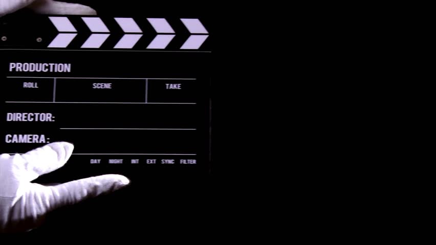 movie film clapperboard or film slate on black background studio. Clapperboard Shuts to Start Shooting Movie. Movie Clapper Board on Black Background.