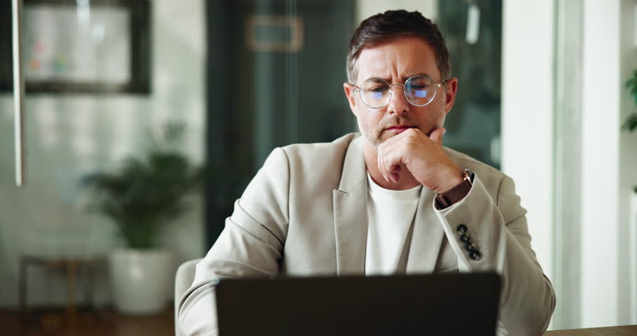 Businessman, financial advisor and thinking with laptop, audit and budget for customer portfolio or policy. Person, accountant or agent with serious plan for consultation advice or assistance review