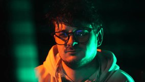 Tired Computer Programmer in Front of Glitching Screen in Dark Room, Taking Off Glasses and Resting Eyes, Close Up - Powered by Shutterstock - Get 15% off with code: PIKWIZARD15