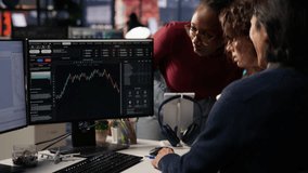 Stressed startup leadership in office dejected after watching stock exchange valuation decline. Sad venture business management seeing stock valuation drop, feeling afraid of bankruptcy, camera B - Powered by Shutterstock - Get 15% off with code: PIKWIZARD15