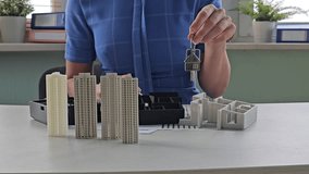 Holding house keys on house shaped keychain concept for buying a new home - Powered by Shutterstock - Get 15% off with code: PIKWIZARD15