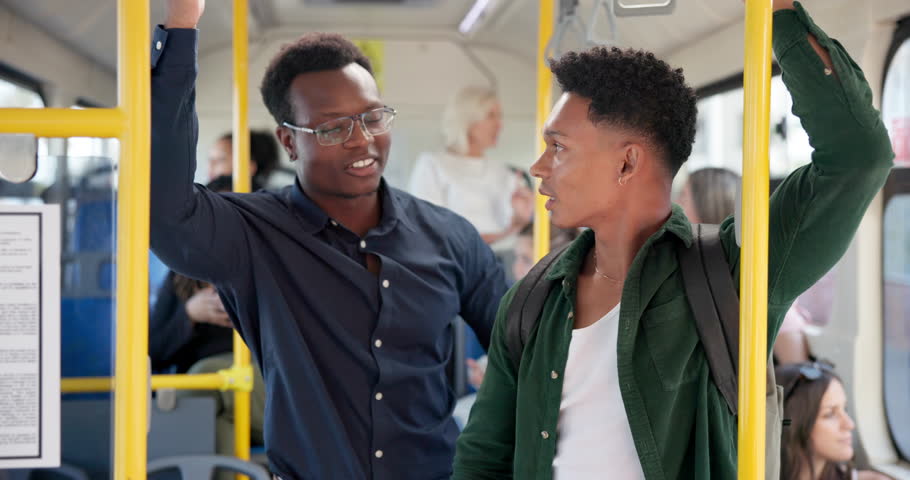 Men, passenger and talking in bus with laughing, joke and funny story with morning travel in city. People, friends and conversation in vehicle with memory, comic chat and public transport for commute