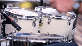 Drumming performance at outdoor event . Music band live performance on city street outdoor. Drums and guitar musical instrument musician, entertainment festival show, park, artist, event.  - Powered by Shutterstock - Get 15% off with code: PIKWIZARD15