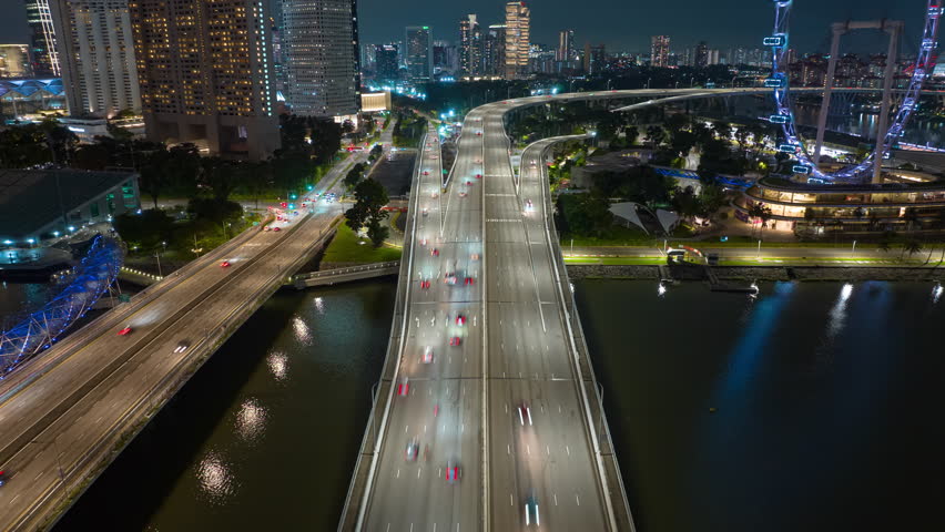night illumination singapore city famous traffic bridge bay aerial panorama 4k timelapse