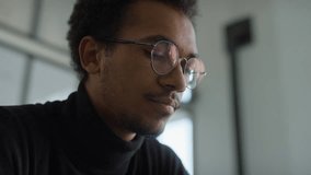 Focused Young Man Working on Laptop - Powered by Shutterstock - Get 15% off with code: PIKWIZARD15