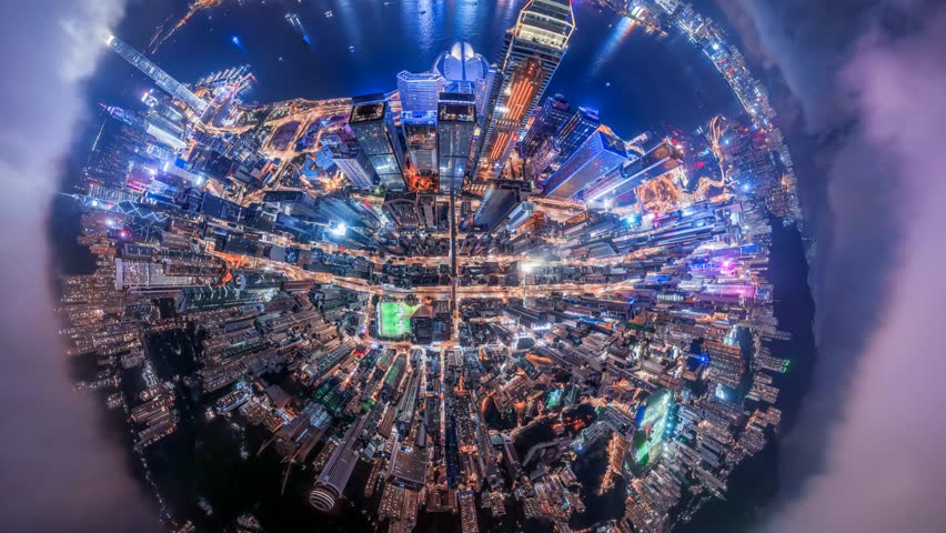 A 4K video zooms in on Hong Kong at night, direction down into the brightly lit cityscape.