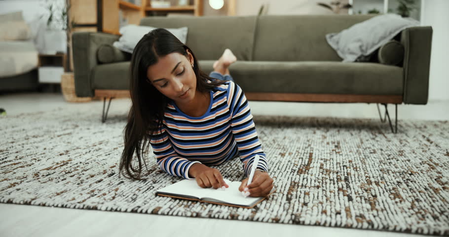 Home, thinking or Indian woman with diary, journal and reflection with creative ideas for writing story. Writer, inspiration or author planning for study, schedule or brainstorming with notes in book