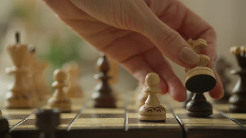 Chess Player Moving Knight Piece Strategically