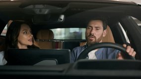 Caucasian couple swearing inside car arguing conflict talking woman girl female girlfriend quarrel with man guy male boyfriend road navigation gps problem stress automobile auto relationships trouble - Powered by Shutterstock - Get 15% off with code: PIKWIZARD15