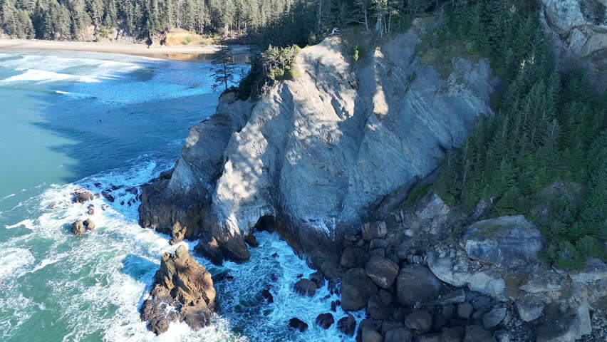 The Pacific Ocean washes against the rugged yet incredibly scenic coastline of northern Oregon. This beautiful area is accessible via highway 101 which runs along the entire west coast.