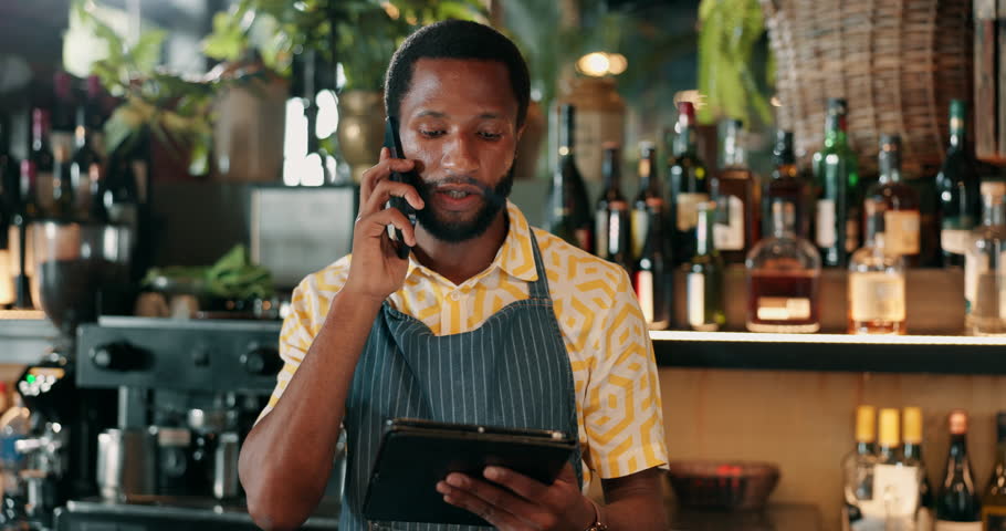 Phone call, tablet and barman with black man at restaurant for wine inventory, supplier checklist and bistro. Waiter, small business owner and vip lounge manager with person at hotel for alcohol